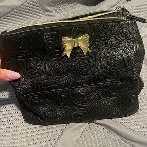 Betsey Johnson Black Embossed Rose Cosmetic Pouch with Gold Bow